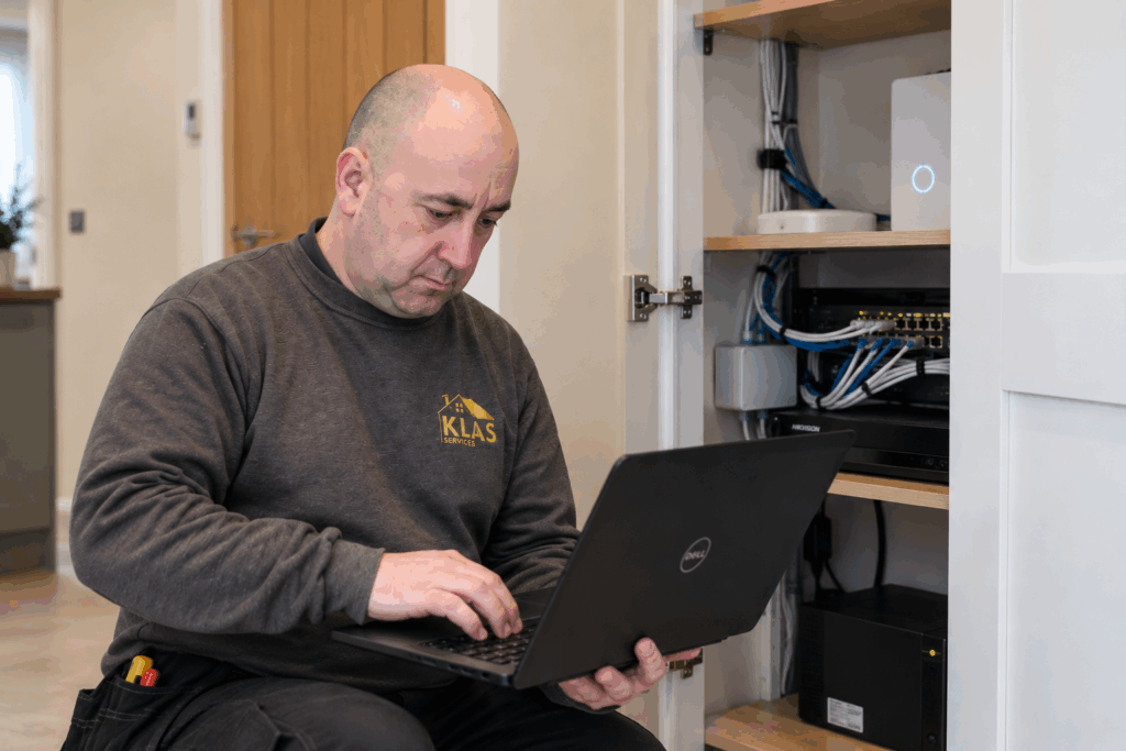 Klas Services technician carrying out network system maintenance